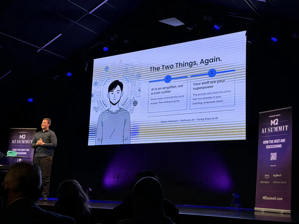 Blake Harkness closing his M2 AI Summit talk with the slide The Two Things, Again: AI is an amplifier, not a cost-cutter, and your staff are your superpower